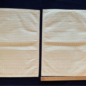 New Ivory placemats with basket weave pattern 13 x 18 inches.